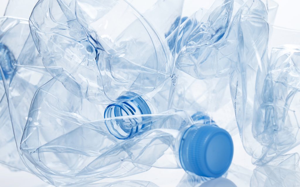 Crumpled up empty plastic water bottles