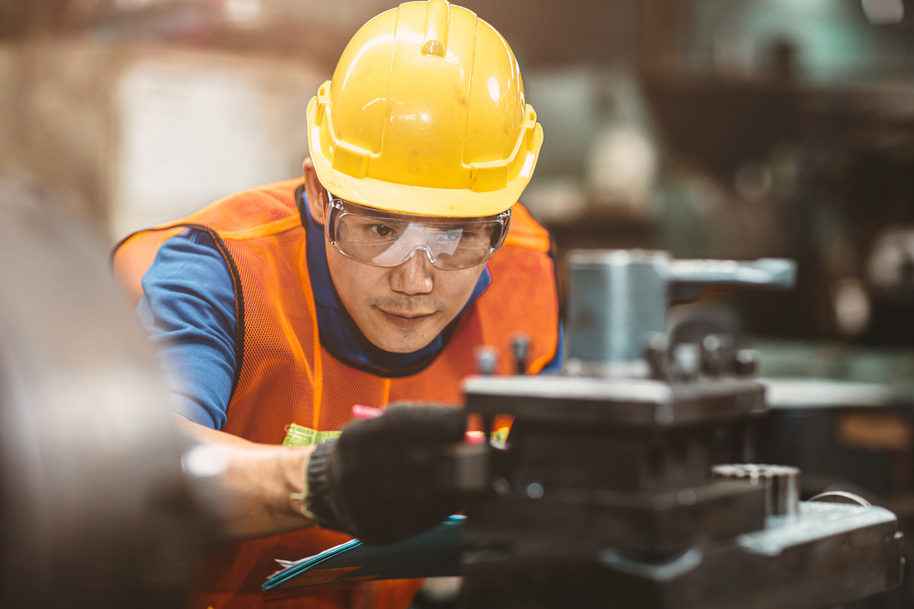 A professional in a plastic injection molding facility