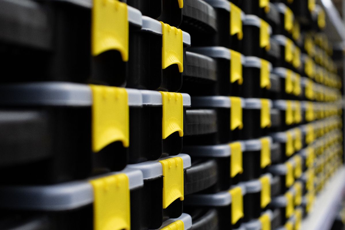 Shelves of customized platic injection molded storage bins